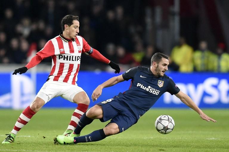 Ten-man PSV hold on for Atletico stalemate
